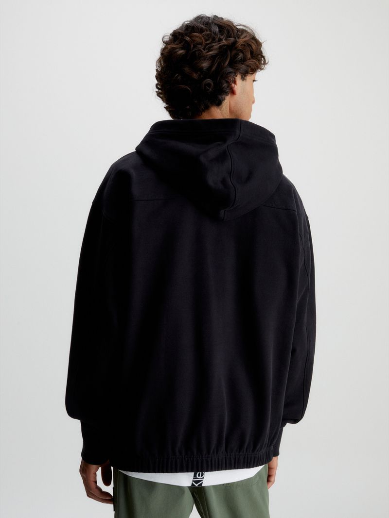 Buzo-oversize-con-capucha-y-monograma