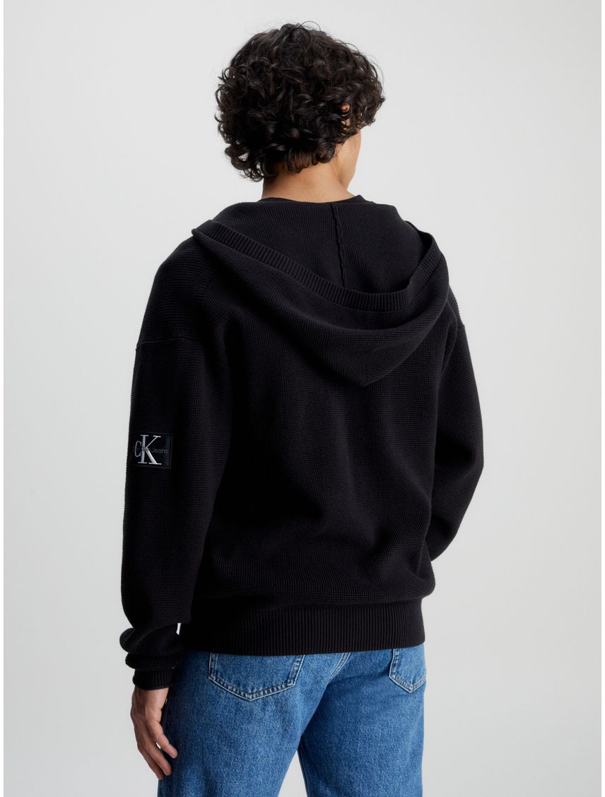 Sweater con capucha de algodón gofrado