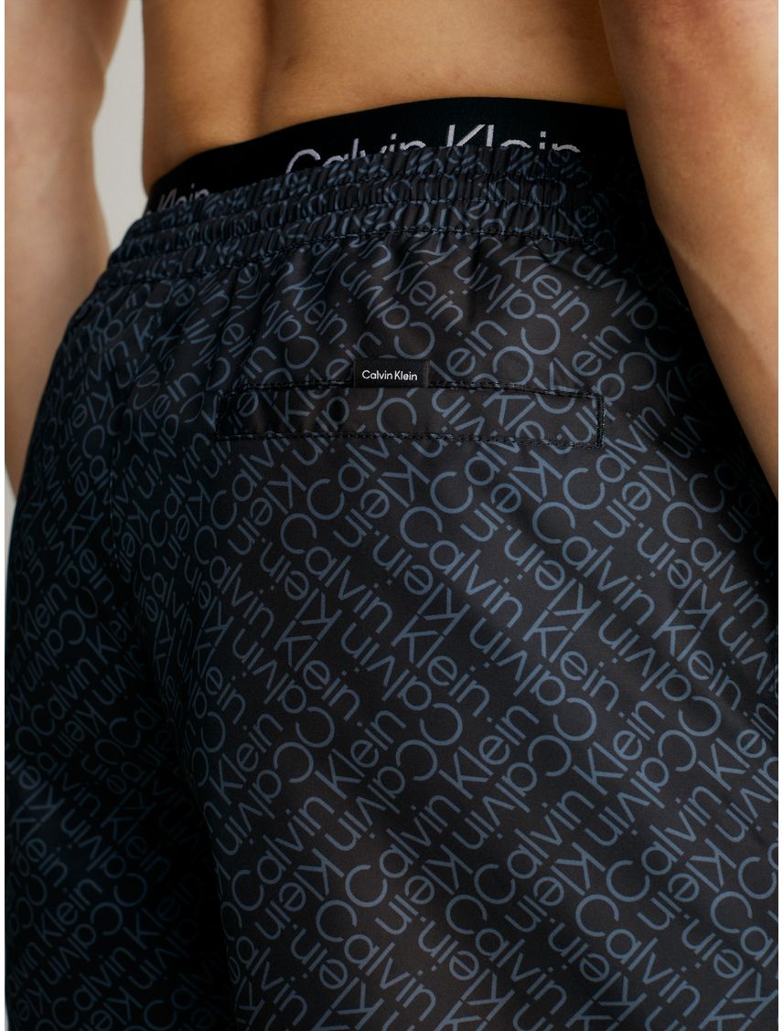 Traje de baño con estampado de logo en zigzag