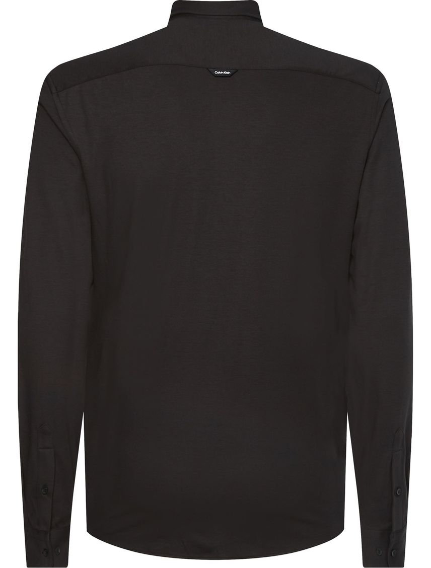 Camisa slim manga larga con bolsillo